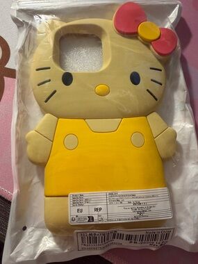 Source Unknown Yellow Hello Kitty Silicone Phone Case with Pink Bow